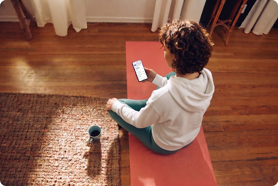 A property owner reviewing rental income on a phone
